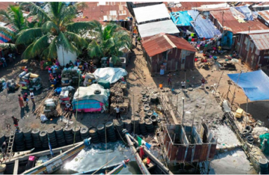 An aerial view of Aberdeen Cockle Bay Slum in Freetown on November 30, 2022 | Photo by   Saidu Bah/AFP.