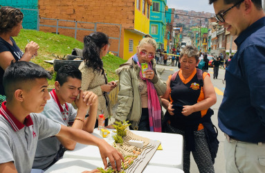 copy_of_neighborhood_teens_explain_plans_for_the_outdoor_classroom_._urban95_bogota_crezco_con_mi_barrio_pilot_project_bogota_colombia_2018._photo_taken_by_kali_silverman.jpeg