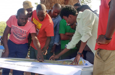 copy_of_the_community_of_the_informal_settlement_of_kuvukiland_namibia_in_a_discussion_about_an_upgrading_plan_that_they_were_involved_with._1.jpg